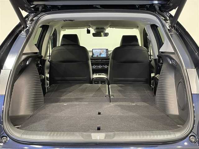 ホンダ ＺＲ－Ｖ ハイブリッド e:HEV Z 愛知県 2024(令6)年 1.1万km ミッドナイトブルービームM 純正９インチナビ　/(USB/AM/フルセグTV/Bluetooth/FM/CarPlay)/アラウンドビューモニター　/ホンダセンシング　/　　-衝突軽減ブレーキ/　　-誤発進抑制機能/　　-路線逸脱抑制機能/　　-アダプティブクルーズコントロール/　　-車線維持支援システム/　　-先行車発進お知らせ機能/　　-標識認識機能/　　-オートハイビーム/　　-ブラインドスポットモニター/電動バックドア　/ビルトインＥＴＣ２．０　/シートヒーター　/ステアリングヒーター　/ドライブレコーダー　/ワイヤレス充電　/ブラインドスポットモニター　/ＬＥＤヘッドライト/パワーシート/パドルシフト/ダウンヒルアシスト