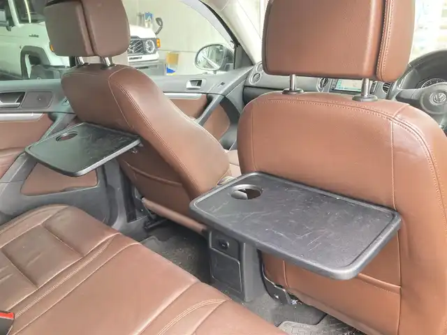 フォルクスワーゲン ティグアン TSI Bモーションテクノロジー 長崎県 2013(平25)年 9.9万km ディープブラックパールエフェクト ディーラーOP/SDナビ/・Bluetooth接続/・フルセグTV/・DVD再生/バックカメラ/ETC/茶革シート/パワーシート/シートヒーター/HIDオートヘッドライト/フォグライト/MTモード付AT/電子パーキング/オートホールド機能/クルーズコントロール