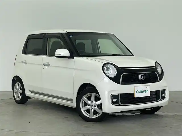 ホンダ Ｎ ＯＮＥ プレミアム 富山県 2016(平28)年 6.3万km プレミアムホワイトパールⅡ 純正ナビ（AM/FM/DVD/BT/フルセグ）/バックカメラ/ETC/ハーフレザーシート/横滑り防止装置/純正アルミホイール/純正フロアマット/電動格納ミラー/革巻きステアリング/ステアリングスイッチ/社外アルミホイール付冬タイヤ積載有/スマートキー/スペアキー