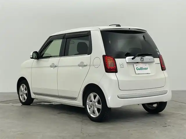 ホンダ Ｎ ＯＮＥ プレミアム 富山県 2016(平28)年 6.3万km プレミアムホワイトパールⅡ 純正ナビ（AM/FM/DVD/BT/フルセグ）/バックカメラ/ETC/ハーフレザーシート/横滑り防止装置/純正アルミホイール/純正フロアマット/電動格納ミラー/革巻きステアリング/ステアリングスイッチ/社外アルミホイール付冬タイヤ積載有/スマートキー/スペアキー