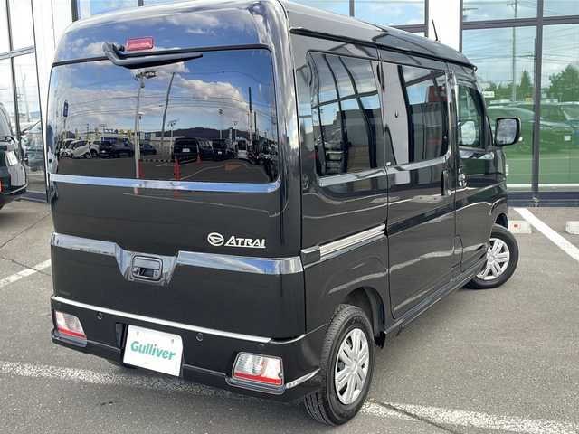ダイハツ アトレー バン RS 道東・釧路十勝 2022(令4)年 5.5万km ブラックマイカメタリック ・４WD/・社外ディスプレイオーディオ/(AM FM Bluetooth AppleCarPlay AndroidAuto)/・バックカメラ/・アダプティブクルーズコントロール/・両側ワンタッチパワースライドドア/・車線逸脱警報/・衝突被害軽減システム/・誤発進抑制機能/・前後クリアランスソナー/・オートマチックハイビーム/・LEDヘッドランプ/・先行車発進告知/・標識検知機能/・リアヒーター/・オーバーヘッドシェルフ/・純正ホイールキャップ/・スタッドレスタイヤ＋スチールW車載/・保証書/・取扱説明書