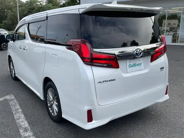 トヨタ アルファードハイブリット S タイプゴールド 青森県 2021(令3)年 8.4万km ホワイトパールクリスタルシャイン ワンオーナー/フロントモデリスタエアロ/メモリナビ/ワンセグテレビ/バックカメラ/フリップダウンモニター/ウィンカーミラー/クルーズコントロール/ドアバイザー/両側パワースライドドア/ETC/ウィンカーミラー/スタッドレスタイヤ車載/ドライブレコーダー/スペアキー1個