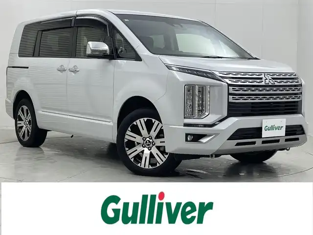 三菱 デリカＤ：５ P 茨城県 2023(令5)年 1.3万km ホワイトダイヤモンド １０．１型純正モニター/純正メモリーナビ/アラウンドビュー/ＥＴＣ/ドライブレコーダー（前方）/ｅ－Ａｓｓｉｓｔ/ＬＥＤヘッドライト/両側パワースライドドア/パワーバックドア/パドルシフト/シートヒーター/ステアリングヒーター