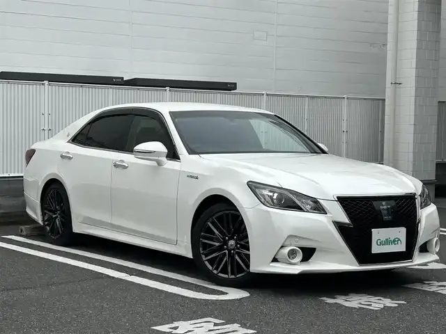 トヨタ クラウン ハイブリッド アスリートS ブラックスタイル 群馬県 2014(平26)年 6.3万km ホワイトパールクリスタルシャイン 純正ナビ(FM・AM/DVD)/Bluetooth接続/フルセグテレビ/ビルトインETC/クルーズコントロール(追従走行あり)/全方位ドライブレコーダー/横滑り防止装置/バックカメラ/コーナーセンサー(前後)/オートライト/LEDヘッドライト/電格ミラー/ダブルエアバック/カーテンエアバック/純正レザーシート/D+Nパワーシート/スマートキー×2/プッシュスタート/純正アルミホイール/MODELLISTAマフラー4本/取扱説明書/保証書
