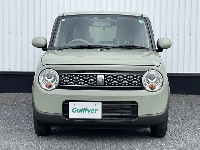 スズキ ラパン X 千葉県 2024(令6)年 0.4万km トラッドカーキメタリック 純正ディスプレイオーディオ/(BT/FM/AM)/デジタルインナー型前後ドラレコ/バックカメラ/衝突被害軽減システム/車線逸脱警報/横滑り防止装置/ETC/アイドリングストップ/LEDヘッドライト/オートライト/ウィンカーミラー/電動格納ミラー/純正14インチAW/前席シートヒーター/シートリフター/プッシュスタート/スマートキー/純正フロアマット/純正ドアバイザー/スペアキー/取扱説明書/保証書