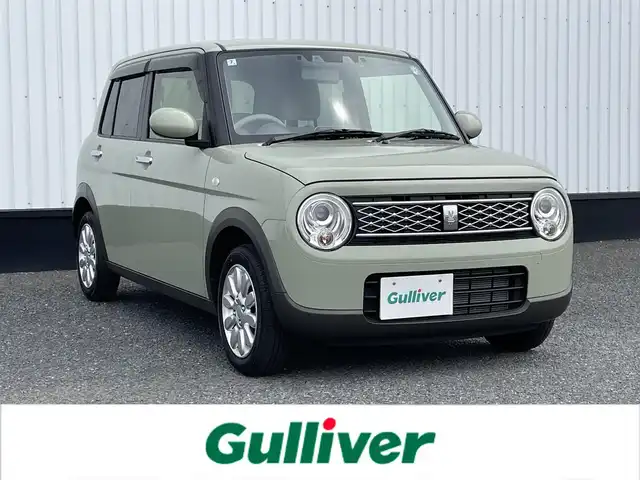 スズキ ラパン X 千葉県 2024(令6)年 0.4万km トラッドカーキメタリック 純正ディスプレイオーディオ/(BT/FM/AM)/デジタルインナー型前後ドラレコ/バックカメラ/衝突被害軽減システム/車線逸脱警報/横滑り防止装置/ETC/アイドリングストップ/LEDヘッドライト/オートライト/ウィンカーミラー/電動格納ミラー/純正14インチAW/前席シートヒーター/シートリフター/プッシュスタート/スマートキー/純正フロアマット/純正ドアバイザー/スペアキー/取扱説明書/保証書