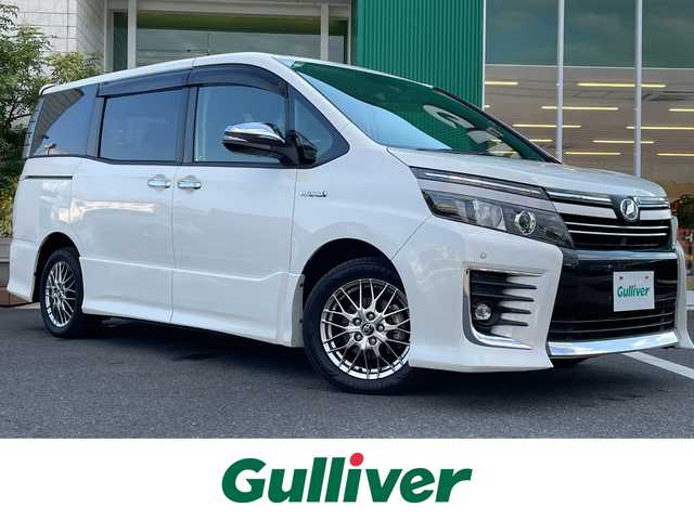 トヨタ ヴォクシー ハイブリッド ZS 煌Ⅱ 岡山県 2017(平29)年 6.6万km ホワイトパールクリスタルシャイン 純正9インチナビ　NSZT-Y66T/フルセグTV、CD、DVD、AM、FM、Bluetooth/バックカメラ/ビルトインETC/両側パワースライドドア/トヨタセーフティセンス/・プリクラッシュセーフティ/・レーントレーシングアシスト/・オートマチックハイビーム/ドライブレコーダー