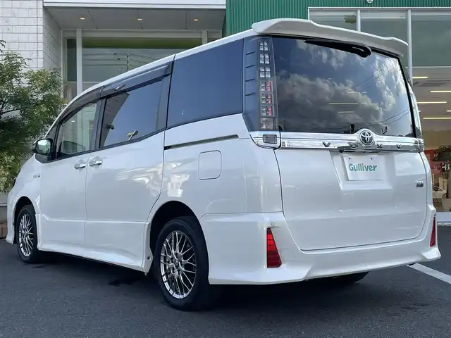 トヨタ ヴォクシー ハイブリッド ZS 煌Ⅱ 岡山県 2017(平29)年 6.6万km ホワイトパールクリスタルシャイン 純正9インチナビ　NSZT-Y66T/フルセグTV、CD、DVD、AM、FM、Bluetooth/バックカメラ/ビルトインETC/両側パワースライドドア/トヨタセーフティセンス/・プリクラッシュセーフティ/・レーントレーシングアシスト/・オートマチックハイビーム/ドライブレコーダー