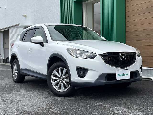 マツダ ＣＸ－５ 20S 岐阜県 2014(平26)年 7.7万km クリスタルホワイトパールマイカ 禁煙車/純正SDナビ/AM/FM/CD/DVD/BT/AUX/フルセグTV/バックカメラ/クルーズコントロール/衝突軽減ブレーキ/トラクションコントロールシステム/istop/ヘッドライトレベライザー/オートライト/ステアリングスイッチ/AC/トノカバー/スタッドレスAWセット積込