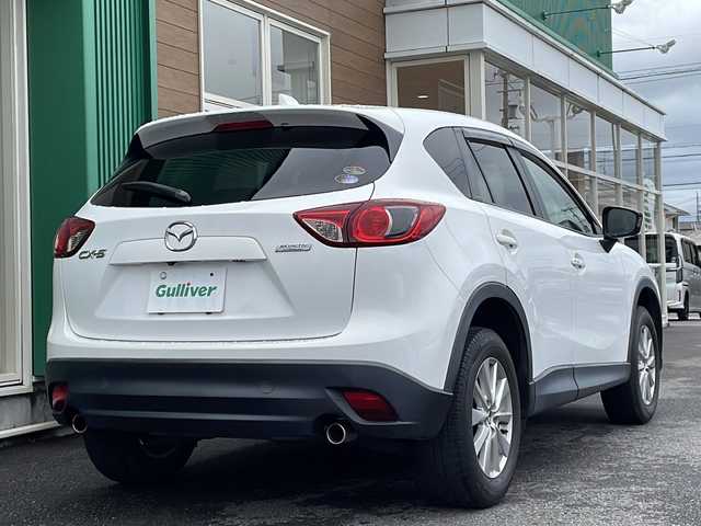 マツダ ＣＸ－５ 20S 岐阜県 2014(平26)年 7.7万km クリスタルホワイトパールマイカ 禁煙車/純正SDナビ/AM/FM/CD/DVD/BT/AUX/フルセグTV/バックカメラ/クルーズコントロール/衝突軽減ブレーキ/トラクションコントロールシステム/istop/ヘッドライトレベライザー/オートライト/ステアリングスイッチ/AC/トノカバー/スタッドレスAWセット積込