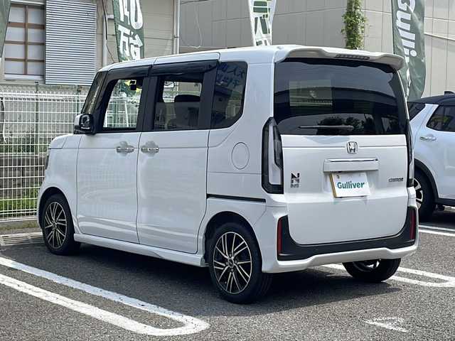 ホンダ Ｎ ＢＯＸ カスタム ターボ 兵庫県 2024(令6)年 1.6万km プラチナホワイトパール 登録時走行距離15342km/ターボ/7CVT/Honda SENSING/彩速ナビ/フルセグTV/Bluetooth/バックカメラ/渋滞追従機能付アダプティブクルーズコントロール/パーキングセンサーシステム/衝突軽減ブレーキ/近距離衝突軽減ブレーキ/合皮はーうレザーシート/前席シートヒーター/シートバックテーブル（運転席/助手席/パドルシフト/両側パワースライドドア/フルLEDヘッドランプ/ロールサンシェード（後席左右）/取扱説明書・保証書