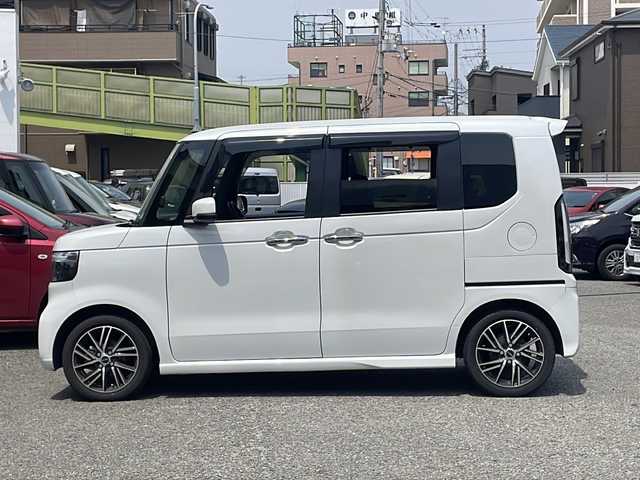 ホンダ Ｎ ＢＯＸ カスタム ターボ 兵庫県 2024(令6)年 1.6万km プラチナホワイトパール 登録時走行距離15342km/ターボ/7CVT/Honda SENSING/彩速ナビ/フルセグTV/Bluetooth/バックカメラ/渋滞追従機能付アダプティブクルーズコントロール/パーキングセンサーシステム/衝突軽減ブレーキ/近距離衝突軽減ブレーキ/合皮はーうレザーシート/前席シートヒーター/シートバックテーブル（運転席/助手席/パドルシフト/両側パワースライドドア/フルLEDヘッドランプ/ロールサンシェード（後席左右）/取扱説明書・保証書