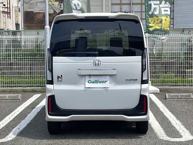 ホンダ Ｎ ＢＯＸ カスタム ターボ 兵庫県 2024(令6)年 1.6万km プラチナホワイトパール 登録時走行距離15342km/ターボ/7CVT/Honda SENSING/彩速ナビ/フルセグTV/Bluetooth/バックカメラ/渋滞追従機能付アダプティブクルーズコントロール/パーキングセンサーシステム/衝突軽減ブレーキ/近距離衝突軽減ブレーキ/合皮はーうレザーシート/前席シートヒーター/シートバックテーブル（運転席/助手席/パドルシフト/両側パワースライドドア/フルLEDヘッドランプ/ロールサンシェード（後席左右）/取扱説明書・保証書