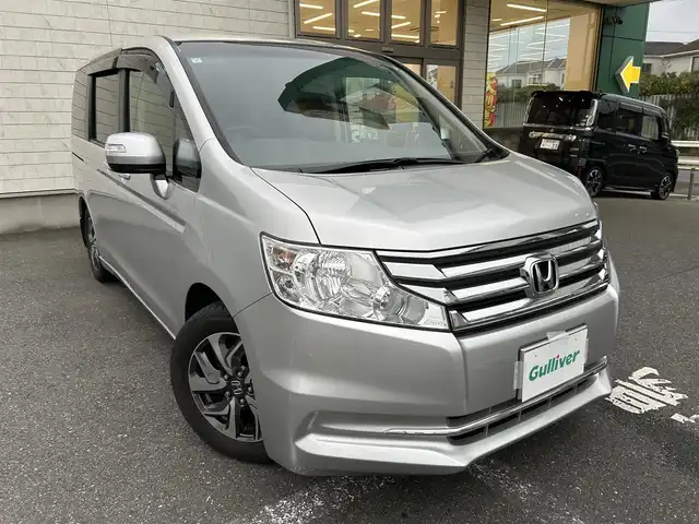 ホンダ ステップワゴン G インターナビコンフォートセレ 埼玉県 2013(平25)年 3.8万km スーパープラチナメタリック 純正ナビ（AM/FM/TV）/バックカメラ/クルーズコントロール/ビルトインＥＴＣ/両側パワースライドドア/純正フロアマット/純正16インチAW/ドアバイザー/オートライト/ヘッドライト/横滑り防止/アイドリングストップ/電動格納ミラー/スマートキー/スペアキー1本/保証書/車両/ナビ取扱説明書