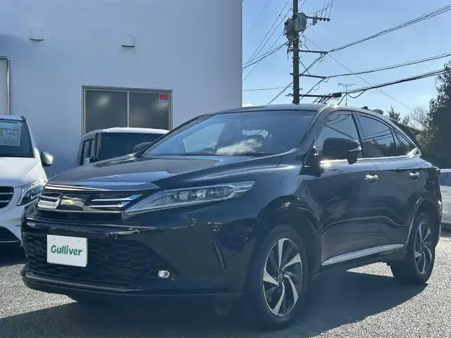 トヨタ ハリアー プレミアム 熊本県 2019(平31)年 12.4万km ブラック ワンオーナー/パノラマムーンルーフ/純正9インチナビ（NSZT-Y68T）/【フルセグTV/Bluetooth/CD/DVD】/バックカメラ/レーダークルーズコントロール/プリクラッシュセーフティー/レーンディパーチャーアラート/クリアランスソナー/オートLEDライト/オートハイビーム/ウィンカーミラー/ブレーキホールド/パワーバックドア/ハーフレザーシート/D席パワーシート/純正18インチAW/革巻きステアリング/ステアリングスイッチ/ドライブレコーダー前後/ETC/プッシュスタート/スマートキー/純正フロアマット/横滑り防止装置/アイドリングストップ/ABS/保証書/スペアキー
