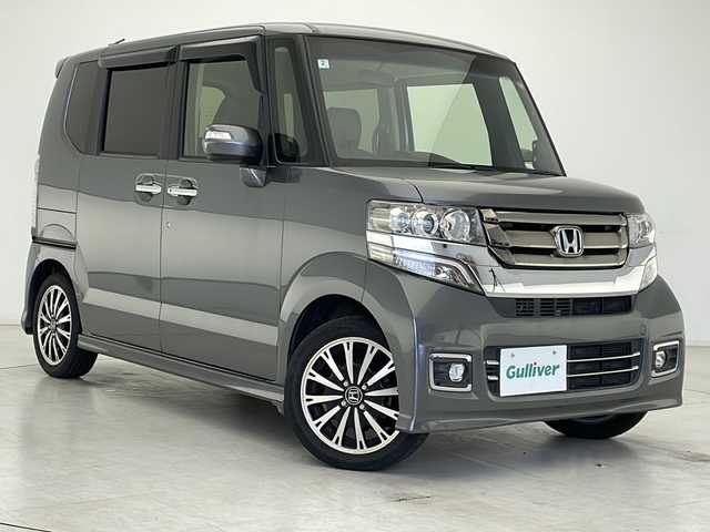 ホンダ Ｎ ＢＯＸ カスタム G ターボ Lパッケージ 千葉県 2016(平28)年 7万km ポリッシュドメタルメタリック 純正ナビ/　DVD/CD/BT/AM/FM/フルセグTV/ステアリングスイッチ/バックカメラ/アイドリングストップ/クルーズコントロール/両側パワースライドドア/パドルシフト/純正アルミホイール/ドアバイザー/フロアマット/ウインカーミラー/ハーフレザーシート/ベンチシート/チップアップシート/キセノンヘッドライト/フォグランプ