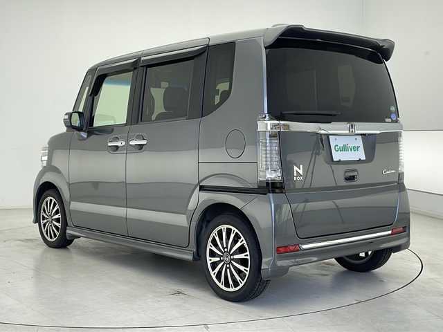 ホンダ Ｎ ＢＯＸ カスタム G ターボ Lパッケージ 千葉県 2016(平28)年 7万km ポリッシュドメタルメタリック 純正ナビ/　DVD/CD/BT/AM/FM/フルセグTV/ステアリングスイッチ/バックカメラ/アイドリングストップ/クルーズコントロール/両側パワースライドドア/パドルシフト/純正アルミホイール/ドアバイザー/フロアマット/ウインカーミラー/ハーフレザーシート/ベンチシート/チップアップシート/キセノンヘッドライト/フォグランプ