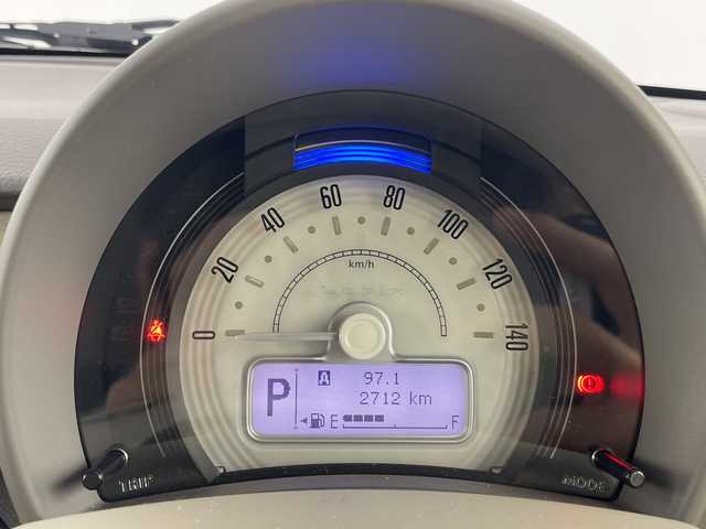 スズキ ラパン L 愛知県 2024(令6)年 0.3万km トラッドカーキメタリック 禁煙車/純正7インチナビ/(フルセグTV/CD/DVD/USB/Bluetooth)/バックカメラ/スズキセーフティシステム/・衝突軽減ブレーキ/・車線逸脱警報/・アイドリングストップ/後部コーナーセンサー/シートヒーター/ステアリングリモコン/電動格納ミラー/ドアバイザー/プッシュスタート/スマートキー/LEDヘッドライト/オートライト/盗難防止装置