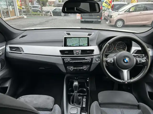 ＢＭＷ Ｘ１ sDrive 18i Mスポーツ 東京都 2017(平29)年 10.5万km アルピンホワイトⅢ ワンオーナー/純正HDDナビ/CD/DVD/FM・AM/Bluetooth//バックカメラ/衝突軽減ブレーキ/レーンディパーチャーアラート/前車接近警告/LIM/コーナーセンサー/ミラー型ETC2.0/純正フロアマット/純正18インチアルミホイール/LEDヘッドライト/フロントフォグランプ/パーキングアシスト/Mスポーツサスペンション/ハイグロスシャドーラインルーフレール/革巻きステアリングホイール/アイドリングストップ/保証書/取扱説明書/スペアキー
