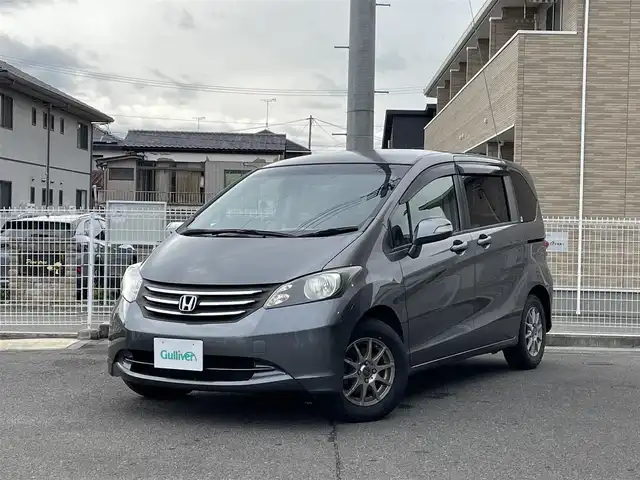 ホンダ フリード G ジャストセレクション 福島県 2011(平23)年 9.4万km ポリッシュドメタルメタリック 社外メモリーナビ/CD/DVD/SD/USB/BT/フルセグTV/社外フリップダウンモニター/片側パワースライドドア/オートライト/キセノンライト/ドアバイザー/フロアマット/キーレス/ETC