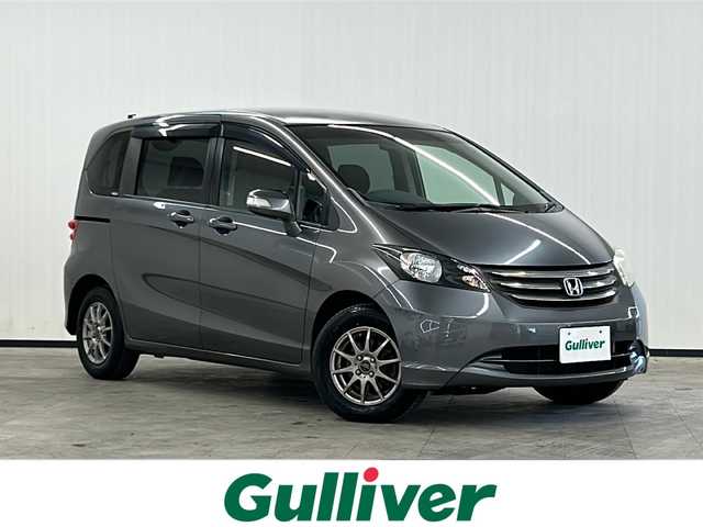 ホンダ フリード G ジャストセレクション 長崎県 2011(平23)年 9.4万km ポリッシュドメタルメタリック ストラーダHDDナビ/・DVD/・フルセグ/アルパインフリップダウンモニター/左側パワースライドドア/オートライト/キセノンライト/ドアバイザー/フロアマット/キーレス/ETC/電格ウィンカーミラー