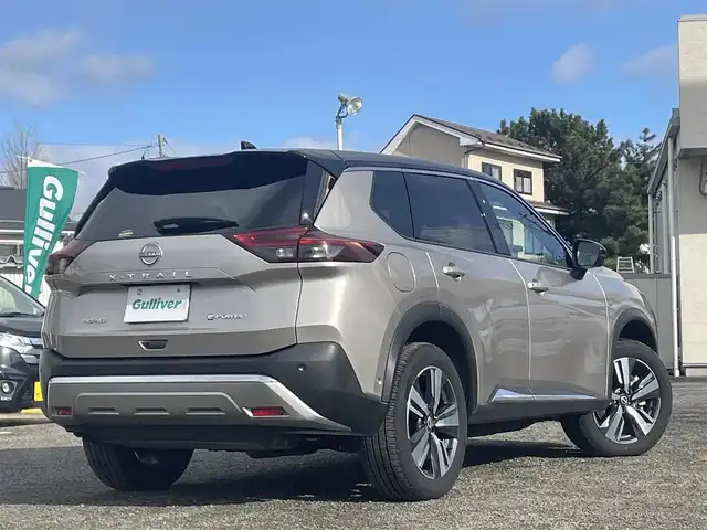 日産 エクストレイル G e－4ORCE 宮城県 2024(令6)年 1.4万km ゴールドⅡ 色コード：XEW　(シェルブロンド/スーパーブラック)//ワンオーナー//プロパイロット//パーキングアシスト//デジタルインナーミラー//純正メモリナビ//AM/FM/USB/BT/フルセグテレビ/スマートフォン連携//前席パワーシート/ステアリングヒーター//全席シートヒーター//アラウンドビューモニター//レーダークルーズコントロール//ブラインドスポットモニター//車線逸脱警報//パワーバックドア//ヘッドアップディスプレイ//AC100V//ワイヤレス充電//純正ドライブレコーダー前後//スマートキーx2
