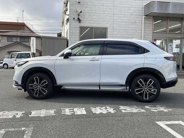 ホンダ ヴェゼル ハイブリッド e:HEV Z 奈良県 2021(令3)年 2.7万km プレミアムサンライトホワイトパール フルセグテレビ/バックカメラ/アイドリングストップ/ACC/ドアバイザー/プッシュスタート/パワーバックドア/ETC2.0/前席シートヒーター/純正ナビ/ホンダセンシング/BSM/コーナーセンサー/ドラレコ前後/ステアリングヒーター/パドルシフト