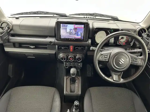 スズキ ジムニー シエラ JC 熊本県 2022(令4)年 7.4万km ジャングルグリーン ワンオーナー　/純正ナビCN-RZ876（ＣＤ・ＤＶＤ・フルセグ・ＢＴ・ＳＤ・ＵＳＢ）/バックカメラ　/社外前後ドライブレコーダー　/ビルトインＥＴＣ　/スズキセーフティサポート/・クルーズコントロール　/・ふらつき警報機能/・標識認識システム/・先行車発進お知らせ/・ハイビームアシスト/・デュアルセンサーブレーキサポート/横滑り防止/アイドリングストップ/ダウンヒルアシスト/前席シートヒーター/ヘッドライトウォッシャー/背面タイヤ/純正フロアマット/純正１５インチAW/オートライト/LEDヘッドライト/フォグライト/スマートキー/プッシュスタート/スペアキー1本/保証書/取扱説明書