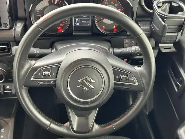 スズキ ジムニー シエラ JC 熊本県 2022(令4)年 7.4万km ジャングルグリーン ワンオーナー　/純正ナビCN-RZ876（ＣＤ・ＤＶＤ・フルセグ・ＢＴ・ＳＤ・ＵＳＢ）/バックカメラ　/社外前後ドライブレコーダー　/ビルトインＥＴＣ　/スズキセーフティサポート/・クルーズコントロール　/・ふらつき警報機能/・標識認識システム/・先行車発進お知らせ/・ハイビームアシスト/・デュアルセンサーブレーキサポート/横滑り防止/アイドリングストップ/ダウンヒルアシスト/前席シートヒーター/ヘッドライトウォッシャー/背面タイヤ/純正フロアマット/純正１５インチAW/オートライト/LEDヘッドライト/フォグライト/スマートキー/プッシュスタート/スペアキー1本/保証書/取扱説明書