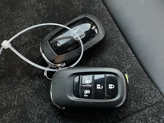 ホンダ Ｎ ＢＯＸ カスタム ターボ 香川県 2024(令6)年 1.5万km プラチナホワイトパール 純正９型ホンダコネクトナビ/マルチビューカメラ/ホンダセンシング/・レーダークルーズコントロール/・車線維持支援システム/・オートハイビーム/・標識認識機能/・歩行者事故低減ステアリング/・路外逸脱抑制機能/・先行車発進お知らせ機能/・標識認識機能/前後ドライブレコーダー/ＥＴＣ/スマートキー/スペアキー/純正15インチAW/電子パーキング/ブレーキホールド