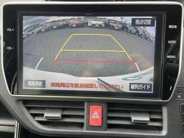 トヨタ ヴォクシー ZS 栃木県 2017(平29)年 6.7万km ホワイトパールクリスタルシャイン ワンオーナー/TRDフロントエアロ/純正10インチナビ/（CD/DVD/Bluetooth/SD）/フルセグTV（キャンセラー付）/バックカメラ/純正12.1型フリップダウンモニター/ビルドインETC2.0/両側パワースライドドア/レザー調シートカバー/トヨタセーフティセンス/・衝突軽減ブレーキ/・車線逸脱警報/・オートマチックハイビーム/純正ドラレコ/2.1AUSBコンポート/オートライト/LEDヘッドライト/フォグランプ/純正16インチAW/プッシュスタート/スマートキー/スペアキー/ステアリングスイッチ/革巻きステアリング/保証書/取説/ナビ取説
