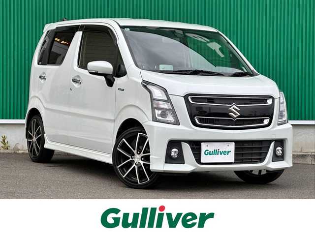 スズキ ワゴンＲ スティングレー HYBRID X 宮城県 2018(平30)年 5.3万km ピュアホワイトP 社外7インチナビ/(フルセグTV/CD/DVD/SD/BT/USB)/衝突軽減防止システム/車線逸脱警報/ヘッドアップディスプレイ/シートヒーター(D席)/オートエアコン/革巻きステアリング/ステアリングスイッチ/アイドリングストップ/オートライト/ふらつき防止/プッシュスタート＆スマートキー/ウインカー付き電動格納ミラー/盗難防止装置/ドアバイザー/LEDヘッドライト/フォグランプ/純正フロアマット/社外16インチAW