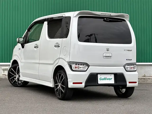 スズキ ワゴンＲ スティングレー HYBRID X 宮城県 2018(平30)年 5.3万km ピュアホワイトP 社外7インチナビ/(フルセグTV/CD/DVD/SD/BT/USB)/衝突軽減防止システム/車線逸脱警報/ヘッドアップディスプレイ/シートヒーター(D席)/オートエアコン/革巻きステアリング/ステアリングスイッチ/アイドリングストップ/オートライト/ふらつき防止/プッシュスタート＆スマートキー/ウインカー付き電動格納ミラー/盗難防止装置/ドアバイザー/LEDヘッドライト/フォグランプ/純正フロアマット/社外16インチAW