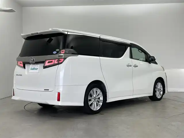トヨタ ヴェルファイア Z Aエディション 埼玉県 2018(平30)年 5.1万km ホワイトパールクリスタルシャイン ALPINEナビ/後席モニター/バックカメラ/フルセグTV/Bluetooth/CD/DVD/ETC/両側パワースライドドア/衝突軽減ブレーキ/レーンキープアシスト/レーダークルーズコントロール/オートハイビーム/電動パーキングブレーキ/オットマン/純正フロアマット/純正18インチAW