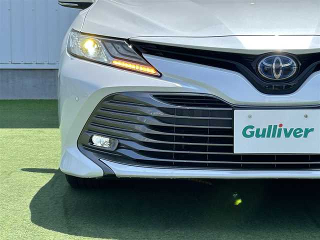 トヨタ カムリ G 香川県 2020(令2)年 10.7万km プラチナホワイトパールマイカ 登録時走行距離：106788km/純正ナビゲーション/→フルセグTV/バックカメラ/JBLプレミアムサウンド/トヨタセーフティセンス/クリアランスソナー/LEDオートライト/17インチ純正アルミホイール/ビルトインETC/ドライブレコーダー/パワーシート/電動格納ミラー/プッシュスタート/スマートキー