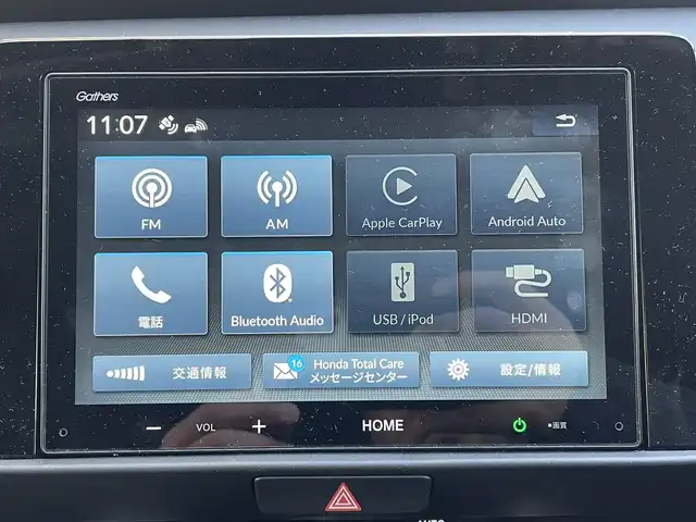 ホンダ フィット e:HEVホーム ブラックスタイル 群馬県 2024(令6)年 0.9万km プレミアムクリスタルレッドM ワンオーナー/純正ディスプレイオーディオ/バックカメラ/ホンダセンシング/ＬＥＤヘッドライト/純正ドライブレコーダー前後カメラ/ステアリングリモコン/スマートキー/保証書/取説/スペアキーｘ１