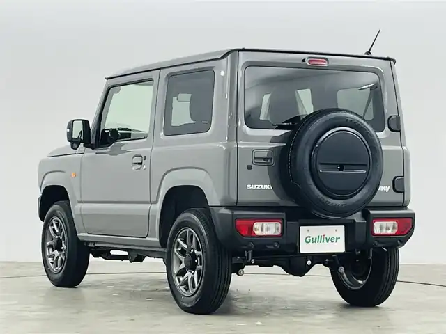 スズキ ジムニー XC 福島県 2025(令7)年 0.1千km ミディアムグレー スズキセーフティサポート/・デュアルカメラブレーキサポート/・誤発進抑制機能（前方・後方）/・後退時ブレーキサポート/・車線逸脱警報機能/・車線逸脱抑制機能/・ふらつき警報機能/・標識認識機能/・フロントガラス投影式ヘッドアップディスプレイ/・先行車発進お知らせ機能/・ハイビームアシスト/・アダプティブクルーズコントロール（全車速追従機能付き）/４WD/前席シートヒーター/LEDヘッドライト/・フォグランプ/・オートライト/ステアリングスイッチ/電動格納ミラー/・ウィンカーミラー/スマートキー/・プッシュスタート