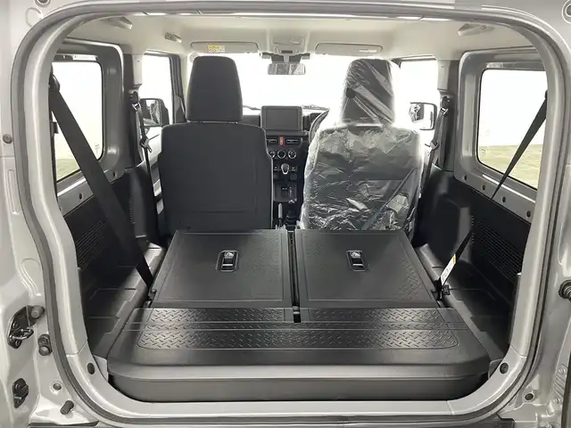 スズキ ジムニー XC 福島県 2025(令7)年 0.1千km ミディアムグレー スズキセーフティサポート/・デュアルカメラブレーキサポート/・誤発進抑制機能（前方・後方）/・後退時ブレーキサポート/・車線逸脱警報機能/・車線逸脱抑制機能/・ふらつき警報機能/・標識認識機能/・フロントガラス投影式ヘッドアップディスプレイ/・先行車発進お知らせ機能/・ハイビームアシスト/・アダプティブクルーズコントロール（全車速追従機能付き）/４WD/前席シートヒーター/LEDヘッドライト/・フォグランプ/・オートライト/ステアリングスイッチ/電動格納ミラー/・ウィンカーミラー/スマートキー/・プッシュスタート