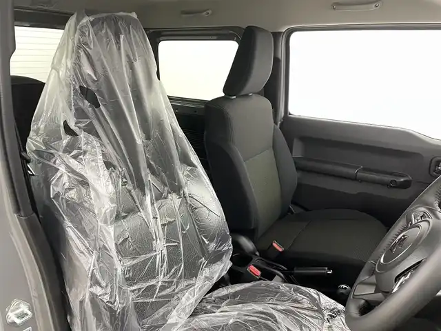 スズキ ジムニー XC 福島県 2025(令7)年 0.1千km ミディアムグレー スズキセーフティサポート/・デュアルカメラブレーキサポート/・誤発進抑制機能（前方・後方）/・後退時ブレーキサポート/・車線逸脱警報機能/・車線逸脱抑制機能/・ふらつき警報機能/・標識認識機能/・フロントガラス投影式ヘッドアップディスプレイ/・先行車発進お知らせ機能/・ハイビームアシスト/・アダプティブクルーズコントロール（全車速追従機能付き）/４WD/前席シートヒーター/LEDヘッドライト/・フォグランプ/・オートライト/ステアリングスイッチ/電動格納ミラー/・ウィンカーミラー/スマートキー/・プッシュスタート