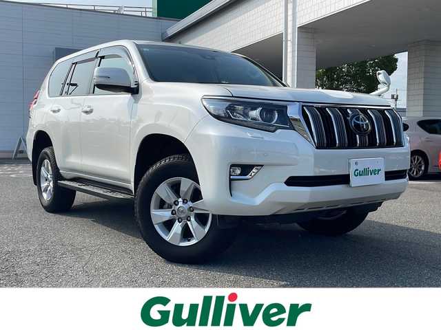 トヨタ ランドクルーザー プラド TX Lパッケージ 兵庫県 2023(令5)年 1.8万km ホワイトパールクリスタルシャイン ワンオーナー/保証書・取説・有/社外メモリーナビ・フルセグ・BT・CD・DVD・FM・AM・HDMI・USB/ETC/バックカメラ/前後ドライブレコーダー/追尾機能付きクルーズコントロール/車線逸脱防止支援システム/衝突被害軽減ブレーキ/コーナーセンサー/シートクーラー/シートヒーター/プッシュスタート/スマートキー×2/純正フロアマット/純正ドアバイザー