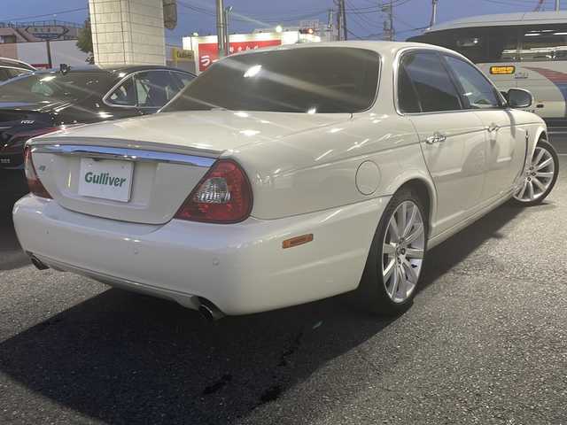 ジャガー ＸＪ 3．0 Executive 東京都 2009(平21)年 5.6万km ポーセリンホワイト DVDナビ/バックカメラ/クルーズコントロール/ETC/電動パーキングブレーキ/革シート/シートヒーター/バーウォールナット木目調インパネ/純正アルミホイール/パワーシート（D/N）/ハロゲンヘッドライト/横滑り防止装置/カーテンエアバック/盗難防止装置/