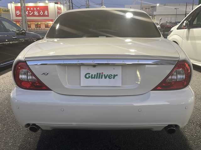ジャガー ＸＪ 3．0 Executive 東京都 2009(平21)年 5.6万km ポーセリンホワイト DVDナビ/バックカメラ/クルーズコントロール/ETC/電動パーキングブレーキ/革シート/シートヒーター/バーウォールナット木目調インパネ/純正アルミホイール/パワーシート（D/N）/ハロゲンヘッドライト/横滑り防止装置/カーテンエアバック/盗難防止装置/