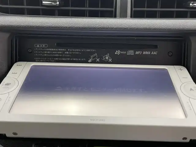 トヨタ アクア S 熊本県 2013(平25)年 8.2万km シルバーM 禁煙車　/純正ナビNSCP-W62（ＢＴ・ワンセグ・ＳＤ・AM・FM）/バックカメラ　/社外前後ドライブレコーダー　/ＥＴＣ　/横滑り防止　/純正フロアマット　/電動格納ミラー　/パワーステアリング　/パワーウインドウ　/オートライト/スマートキー/プッシュスタート