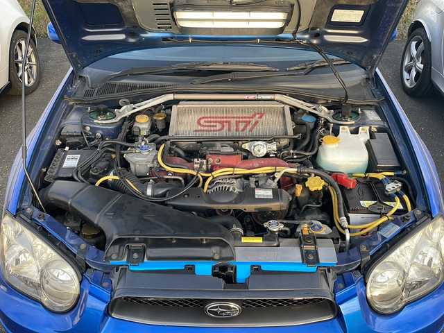 スバル インプレッサ ＷＲＸ STi 岩手県 2003(平15)年 10.9万km WRブルーマイカ 社外SDナビ/フルセグTV/ドライブレコーダー/LEDヘッドライト/キーレスキー/6インチミラーモニター/電動格納ミラー/社外17インチAW/純正ドアバイザー/保証書/取扱説明書