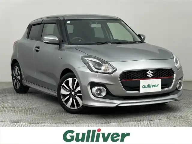 スズキ スイフト HYBRID RS 道央・札幌 2018(平30)年 6.5万km プレミアムシルバーメタリック ・４WD/・カロッツェリアDA（FH-8500DVS）/　CD/DVD/BT/　ステアリングスイッチ非連動/・カロッツェリア サブウーファー/・JBLクロスオーバーネットワーク/・バックカメラ/・ビルトインETC/・外エンジンスターター/・外ドライブレコーダー前方/・外LEDルームランプ（車種専用品）/・外足回り/・外パドルシフト/・シートヒーター（D+N）/・オートライト/・LEDヘッドライト/・前後フォグランプ/・ドアミラーウィンカー/・ミラーヒーター/・ドアバイザー/・フロアマット/・プッシュスタート/・スマートキー