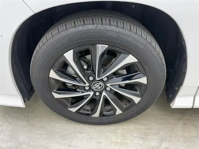 トヨタ ノア ハイブリッド S－Z 岡山県 2024(令6)年 0.9万km ホワイトパールクリスタルシャイン ワンオーナー/パノラミックビューモニター/ユニバーサルステップ/デジタルインナーミラー/ブラインドスポットモニター/ヘッドアップディスプレイ/ビルトインETC2.0/純正7インチディスプレイオーディオ/DVD/CD/地デジ/カープレイ/USB/トヨタセーフティセンス/前後ドラレコ/コーナーセンサー/シートヒーター/ハーフレザーシート（合皮）/両側パワースライドドア/オートハイビーム/レーダークルーズコントロール/AC100V/純正フロアマット