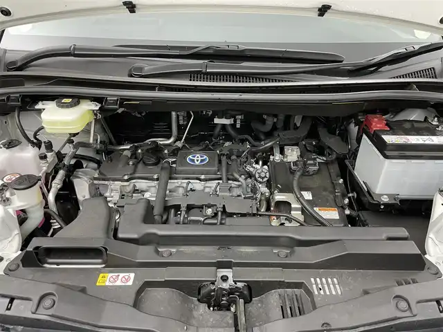 トヨタ ノア ハイブリッド S－Z 岡山県 2024(令6)年 0.9万km ホワイトパールクリスタルシャイン ワンオーナー/パノラミックビューモニター/ユニバーサルステップ/デジタルインナーミラー/ブラインドスポットモニター/ヘッドアップディスプレイ/ビルトインETC2.0/純正7インチディスプレイオーディオ/DVD/CD/地デジ/カープレイ/USB/トヨタセーフティセンス/前後ドラレコ/コーナーセンサー/シートヒーター/ハーフレザーシート（合皮）/両側パワースライドドア/オートハイビーム/レーダークルーズコントロール/AC100V/純正フロアマット