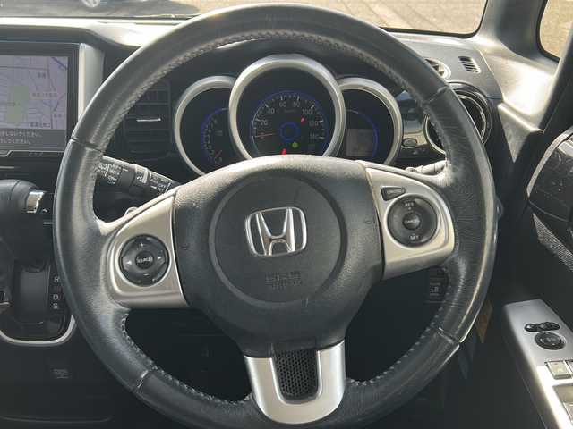 ホンダ Ｎ ＢＯＸ カスタム G ターボ Lパッケージ 富山県 2015(平27)年 14.2万km プレミアムホワイトパールⅡ ワンオーナー/両側パースライドドア/スマートキー×２/社外メモリーナビ(AIC-ZH0999L)/DVD/MSV/BT/デジタルTV/ETC/純正フルエアロ/皮巻きステアリング/ステアリングスイッチ/オートリトラミラー/パドルシフト/横滑り防止装置/電格ウィンカーミラー/クルーズコントロール/プッシュスタート/HIDヘッドライト/フォグ/リアロールシェイド/電格ウィーンカーミラ―/保証書・取説