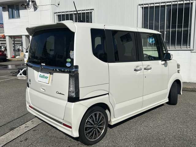 ホンダ Ｎ ＢＯＸ カスタム G ターボ Lパッケージ 富山県 2015(平27)年 14.2万km プレミアムホワイトパールⅡ ワンオーナー/両側パースライドドア/スマートキー×２/社外メモリーナビ(AIC-ZH0999L)/DVD/MSV/BT/デジタルTV/ETC/純正フルエアロ/皮巻きステアリング/ステアリングスイッチ/オートリトラミラー/パドルシフト/横滑り防止装置/電格ウィンカーミラー/クルーズコントロール/プッシュスタート/HIDヘッドライト/フォグ/リアロールシェイド/電格ウィーンカーミラ―/保証書・取説