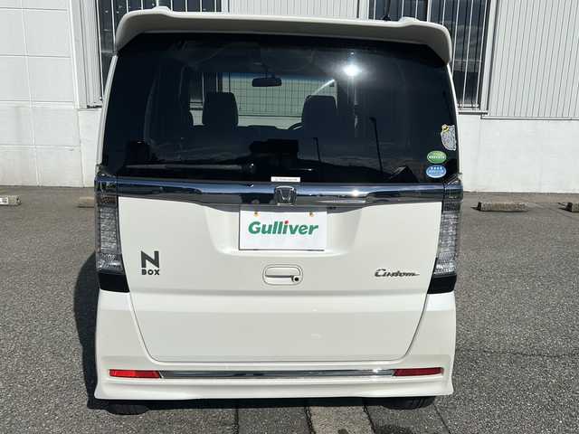 ホンダ Ｎ ＢＯＸ カスタム G ターボ Lパッケージ 富山県 2015(平27)年 14.2万km プレミアムホワイトパールⅡ ワンオーナー/両側パースライドドア/スマートキー×２/社外メモリーナビ(AIC-ZH0999L)/DVD/MSV/BT/デジタルTV/ETC/純正フルエアロ/皮巻きステアリング/ステアリングスイッチ/オートリトラミラー/パドルシフト/横滑り防止装置/電格ウィンカーミラー/クルーズコントロール/プッシュスタート/HIDヘッドライト/フォグ/リアロールシェイド/電格ウィーンカーミラ―/保証書・取説